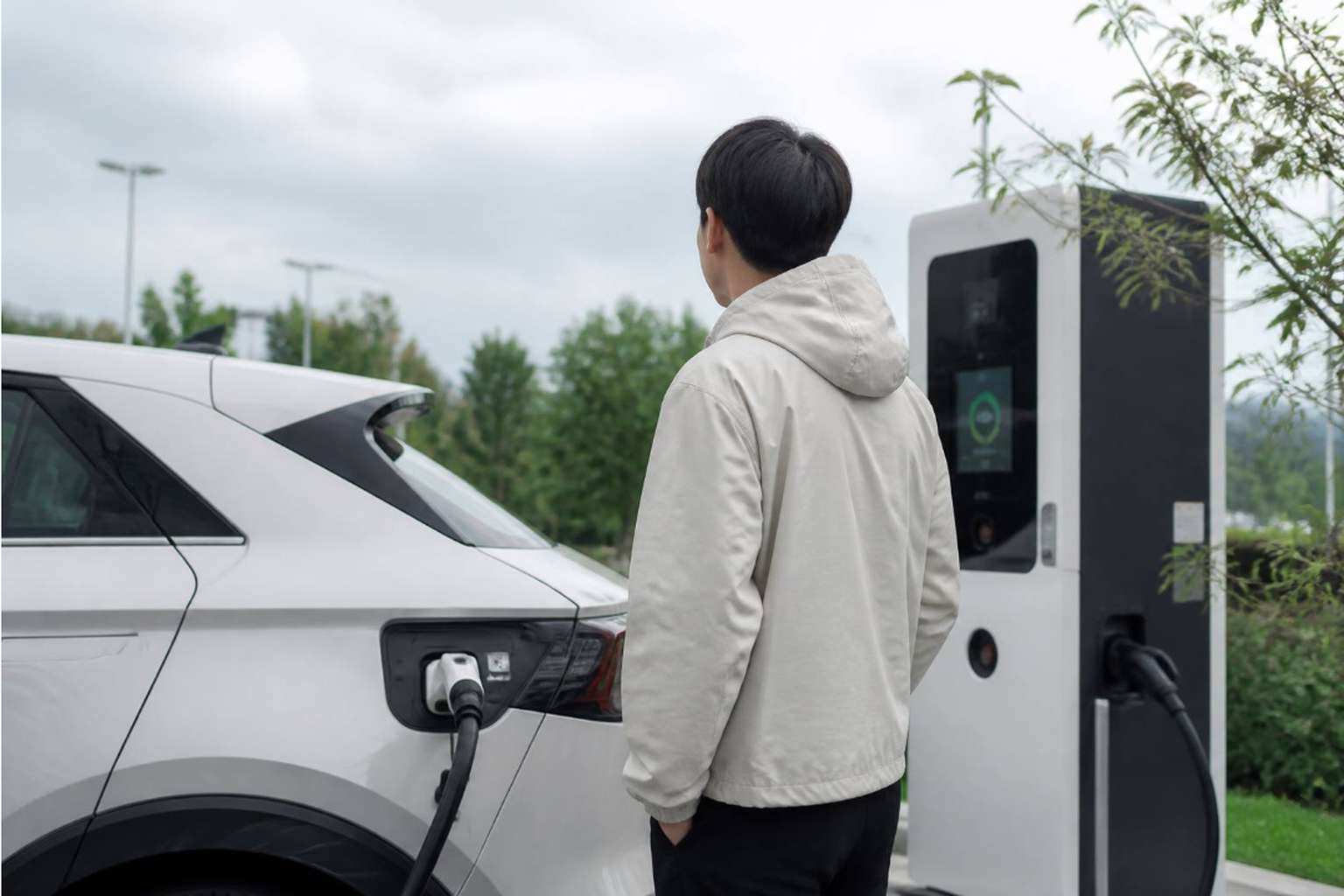 Three EV charging standards side by side: GB/T 20234, Type 2 IEC 62196, SAE J1772 connector comparison
