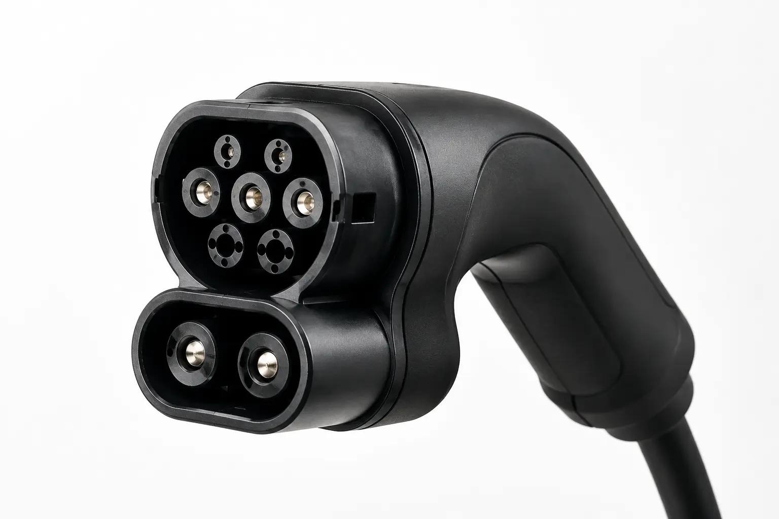 GB/T 20234.2 charging connector close-up - black handle with seven-pin round metal contacts, white background product photo
